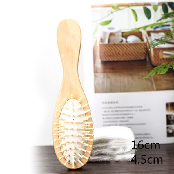 Handcrafted wooden hair comb designed for smooth detangling and shine