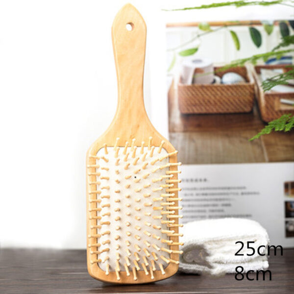 Wooden bristle brush to reduce frizz and promote natural hair shine